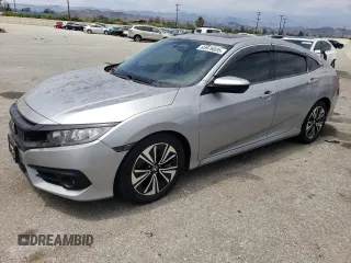 2018 Honda Civic EX-T z VIN JHMFC1F3XJX013113, wystawiony jako Copart lot #65976035 z przebiegiem 110 332 mil mil oraz Szkoda całkowita • Salvage title. Historia ofert i sprzedaży dostępna na DreamBid. Obrazek 1.