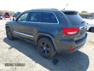 2011 Jeep Grand Cherokee Laredo with VIN 1J4RR4GG7BC715778, listed as a IAAI auction lot 42313636 with 249,209 mi miles and . Bid and sale history available at DreamBid. Image 3.