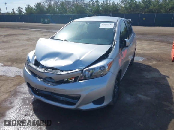2012 Toyota Yaris L with VIN JTDKTUD32CD527322, listed as a IAAI auction lot 42053644 with 115,444 mi miles and . Bid and sale history available at carsss.com. Image 2.