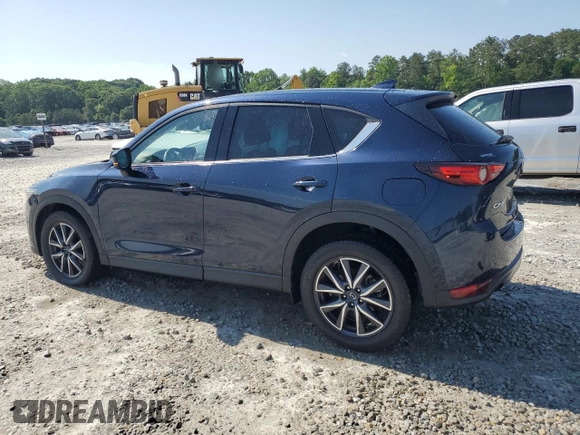 2018 Mazda CX-5 Grand Touring z VIN JM3KFADM5J1420690, wystawiony jako Copart lot #56897875 z przebiegiem 46 483 mil mil oraz Szkoda całkowita • Salvage title. Historia ofert i sprzedaży dostępna na DreamBid. Obrazek 2.