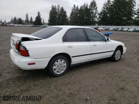 1996 Honda Accord LX with VIN 1HGCD5639TA158062, listed as a Copart auction lot 47434945 with 156,519 mi miles and Salvage Title. Bid and sale history available at DreamBid. Image 3.