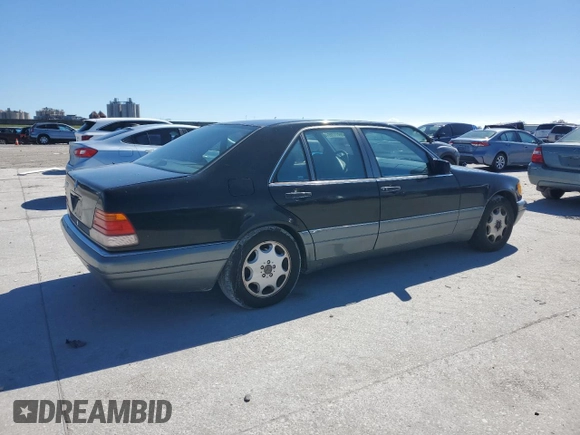 1995 Mercedes-Benz S 320 with VIN WDBGA32E7SA235612, listed as a Copart auction lot 46911705 with 119,900 mi miles and Clean Title. Bid and sale history available at DreamBid. Image 3.
