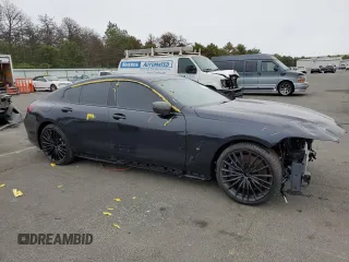 2020 BMW 8 Series M850i with VIN WBAGV8C04LCE45015, listed as a Copart auction lot 73153414 with 25,190 mi miles and Salvage title. Bid and sale history available at DreamBid. Image 4.