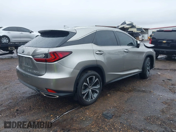 2021 Lexus RX with VIN 2T2HZMDA0MC289343, listed as a IAAI auction lot 41556887 with 42,273 mi miles. Bid and sale history available at carsss.com. Image 4.