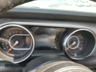 2023 Jeep Gladiator Sport S z VIN 1C6HJTAGXPL573758, wystawiony jako Copart lot #56635955 z przebiegiem Nie podano mil oraz Szkoda całkowita • Salvage title. Historia ofert i sprzedaży dostępna na DreamBid. Obrazek 9.
