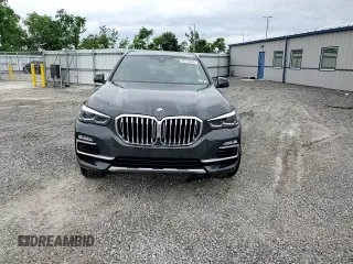 2020 BMW X5 xDrive40i with VIN 5UXCR6C09L9C51165, listed as a Copart auction lot 58212555 with Not provided miles and Salvage title. Bid and sale history available at DreamBid. Image 14.