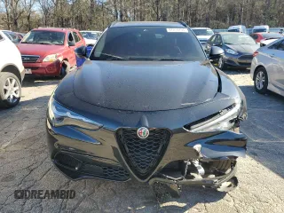 2024 Alfa Romeo Stelvio Ti z VIN ZASPAKBNXR7D70884, wystawiony jako Copart lot #87212794 z przebiegiem 15 162 mil mil oraz Szkoda całkowita • Salvage title. Historia ofert i sprzedaży dostępna na DreamBid. Obrazek 5.