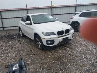 2009 BMW X6 z VIN 5UXFG43589L222459, wystawiony jako IAAI lot #42153883 z przebiegiem 170 650 mil mil oraz . Historia ofert i sprzedaży dostępna na DreamBid. Obrazek 1.