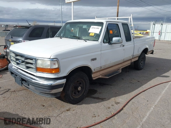 1996 Ford F-150 with VIN 1FTEX14N9TKA35772, listed as a IAAI auction lot 40963486 with 1 mi miles. Bid and sale history available at carsss.com. Image 2.
