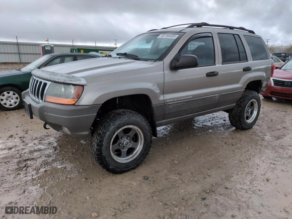 1999 Jeep Grand Cherokee Laredo with VIN 1J4GW58SXXC553547, listed as a Copart auction lot 50786405 with 151,968 mi miles and Salvage Title. Bid and sale history available at carsss.com. Image 1.
