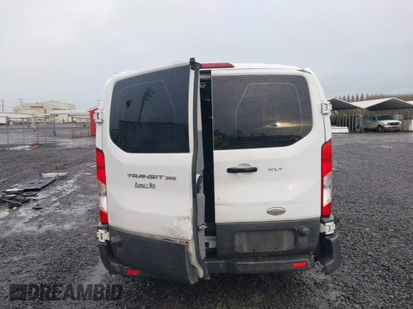 2015 Ford Transit XL with VIN 1FBZX2ZM1FKA53733, listed as a IAAI auction lot 41210136 with 155,458 mi miles and . Bid and sale history available at DreamBid. Image 16.