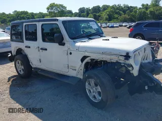 2021 Jeep Wrangler Unlimited Willys z VIN 1C4HJXDG2MW540369, wystawiony jako IAAI lot #42548341 z przebiegiem 135 611 mil mil oraz . Historia ofert i sprzedaży dostępna na DreamBid. Obrazek 1.
