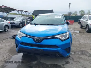2018 Toyota RAV4 LE with VIN JTMBFREV8JJ220630, listed as a IAAI auction lot 42001795 with 86,027 mi miles. Bid and sale history available at carsss.com. Image 12.