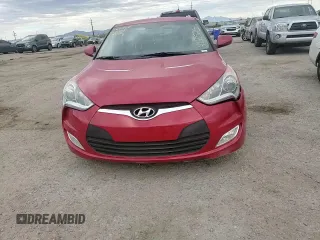 2014 Hyundai Veloster RE:FLEX z VIN KMHTC6AD3EU212525, wystawiony jako Copart lot #52935475 z przebiegiem 54 086 mil mil oraz Szkoda całkowita • Salvage title. Historia ofert i sprzedaży dostępna na DreamBid. Obrazek 11.