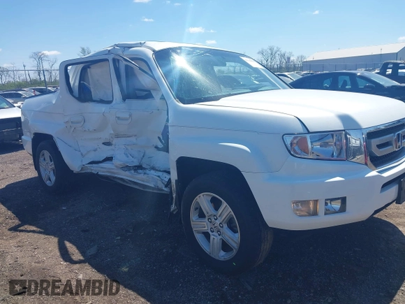 2009 Honda Ridgeline RTL with VIN 5FPYK16529B107871, listed as a IAAI auction lot 42049833 with 141,214 mi miles. Bid and sale history available at carsss.com. Image 1.