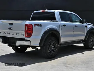 2019 Ford Ranger XL with VIN 1FTER4FH5KLA29401, listed as a Copart auction lot 64990365 with 98,143 mi miles and Salvage title. Bid and sale history available at DreamBid. Image 4.
