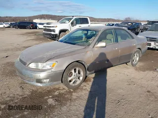 2001 Lexus ES 300 with VIN JT8BF28G610307385, listed as a IAAI auction lot 41383052 with 191,419 mi miles and . Bid and sale history available at DreamBid. Image 2.