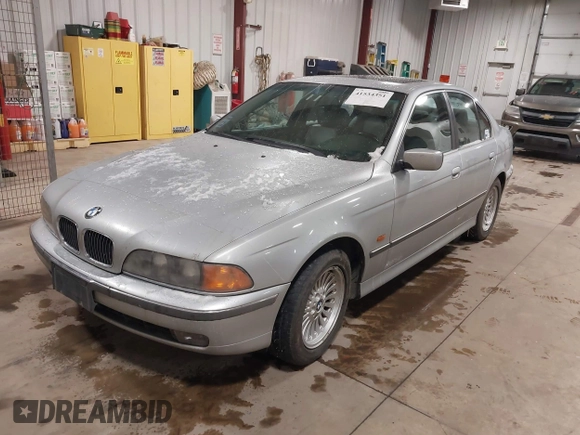 1998 BMW 5 Series 540i z VIN WBADE6320WBW62822, wystawiony jako IAAI lot #41534351 z przebiegiem 228 570 mil mil oraz . Historia ofert i sprzedaży dostępna na DreamBid. Obrazek 2.