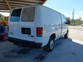 2014 Ford Econoline Cargo Commercial with VIN 1FTNE1EW1EDA66485, listed as a IAAI auction lot 41654271 with 304,974 mi miles and . Bid and sale history available at DreamBid. Image 4.