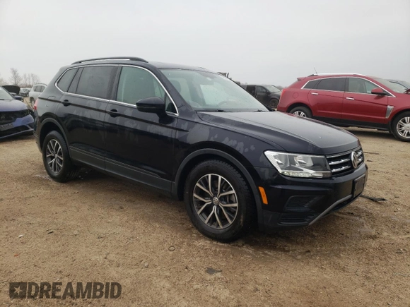 2019 Volkswagen Tiguan SE with VIN 3VV2B7AX2KM201195, listed as a Copart auction lot 52821335 with 72,382 mi miles and Salvage Title. Bid and sale history available at DreamBid. Image 4.