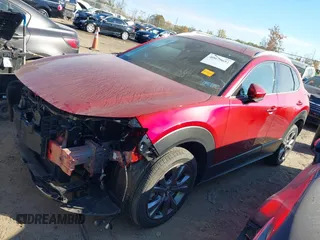 2024 Mazda CX-30 2.5 S Premium Package with VIN 3MVDMBDM0RM628115, listed as a IAAI auction lot 40679651 with 5,082 mi miles. Bid and sale history available at carsss.com. Image 2.