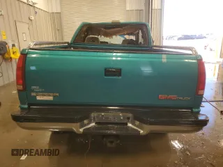 1993 GMC Sierra 1500 z VIN 2GTEK19K8P1562964, wystawiony jako Copart lot #86767744 z przebiegiem 237 615 mil mil oraz Czysty tytuł • Clean title. Historia ofert i sprzedaży dostępna na DreamBid. Obrazek 6.