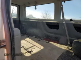 2005 Ford Econoline Passenger XL with VIN 1FBNE31LX5HA76002, listed as a Copart auction lot 43599865 with 198,749 mi miles and Salvage Title. Bid and sale history available at carsss.com. Image 11.