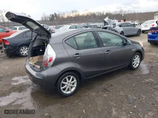 2013 Toyota Prius c One with VIN JTDKDTB31D1531200, listed as a IAAI auction lot 41685835 with 128,996 mi miles. Bid and sale history available at carsss.com. Image 4.