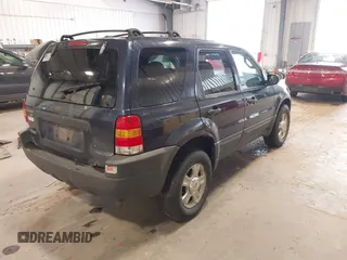 2004 Ford Escape XLT with VIN 1FMYU93134KB36712, listed as a IAAI auction lot 42412101 with 232,340 mi miles and . Bid and sale history available at DreamBid. Image 4.