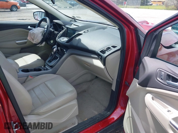 2014 Ford Escape SE with VIN 1FMCU0GX5EUB58169, listed as a IAAI auction lot 42155452 with 89,002 mi miles and . Bid and sale history available at DreamBid. Image 5.