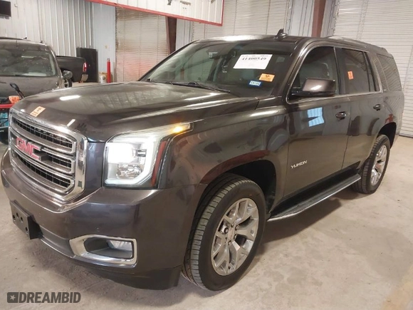 2016 GMC Yukon SLT with VIN 1GKS2BKC8GR277799, listed as a IAAI auction lot 41400549 with 91,139 mi miles. Bid and sale history available at carsss.com. Image 2.