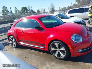 2012 Volkswagen Beetle 2.0T Turbo w/Sun/Sound with VIN 3VWV67ATXCM650376, listed as a IAAI auction lot 41315431 with 104,523 mi miles. Bid and sale history available at carsss.com. Image 13.