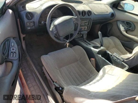 1998 Pontiac Firebird Firebird z VIN 2G2FS22K6W2202173, wystawiony jako Copart lot #77708594 z przebiegiem Nie podano mil oraz Czysty tytuł • Clean title. Historia ofert i sprzedaży dostępna na DreamBid. Obrazek 8.