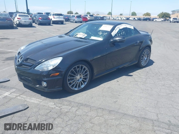 2011 Mercedes-Benz SLK 300 with VIN WDBWK5EA8BF241371, listed as a IAAI auction lot 42047271 with 100,206 mi miles and . Bid and sale history available at DreamBid. Image 2.