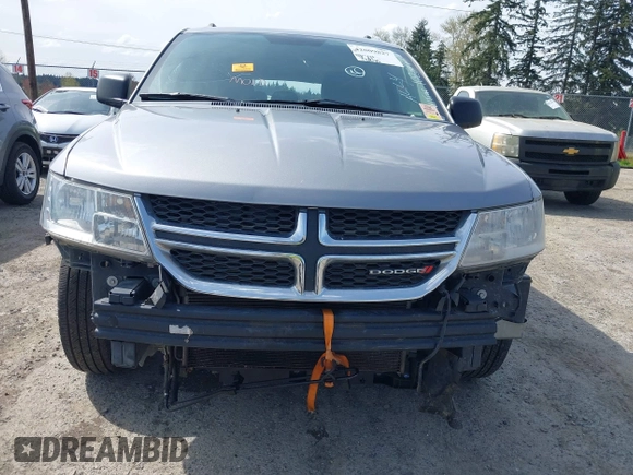 2016 Dodge Journey SE with VIN 3C4PDCAB2GT102871, listed as a IAAI auction lot 42009827 with 197,646 mi miles. Bid and sale history available at carsss.com. Image 6.