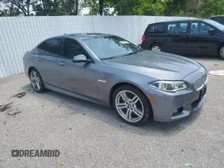 2014 BMW 5 Series 550i xDrive with VIN WBAKP9C51EDZ34830, listed as a Copart auction lot 59906435 with 123,709 mi miles and Salvage title. Bid and sale history available at DreamBid. Image 4.