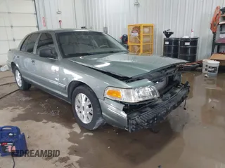 2005 Ford Crown Victoria LX z VIN 2FAFP74W05X124670, wystawiony jako IAAI lot #41581963 z przebiegiem 135 486 mil mil oraz . Historia ofert i sprzedaży dostępna na DreamBid. Obrazek 1.