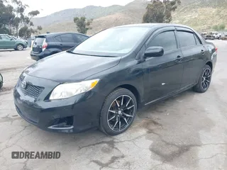 2010 Toyota Corolla with VIN 1NXBU4EE9AZ268818, listed as a IAAI auction lot 42058417 with 115,124 mi miles. Bid and sale history available at carsss.com. Image 2.