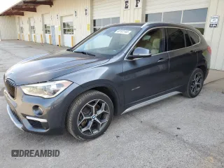 2017 BMW X1 xDrive28i with VIN WBXHT3C35H5F78049, listed as a Copart auction lot 63103165 with 79,849 mi miles and Salvage title. Bid and sale history available at DreamBid. Image 1.