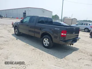 2005 Ford F-150 STX with VIN 1FTRX12W45NB95184, listed as a IAAI auction lot 42406068 with 164,727 mi miles and . Bid and sale history available at DreamBid. Image 3.