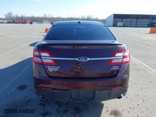 2018 Ford Taurus SEL with VIN 1FAHP2E84JG113599, listed as a IAAI auction lot 41526343 with 105,798 mi miles. Bid and sale history available at carsss.com. Image 17.