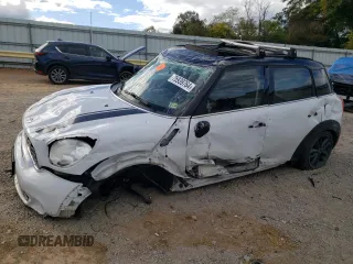 2014 MINI Countryman S z VIN WMWZC5C55EWP38705, wystawiony jako Copart lot #75939764 z przebiegiem 144 944 mil mil oraz Szkoda całkowita • Salvage title. Historia ofert i sprzedaży dostępna na DreamBid. Obrazek 1.