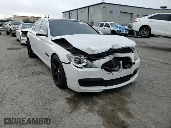2013 BMW 7 Series 740i with VIN WBAYA6C55DC995290, listed as a Copart auction lot 82022284 with 128,882 mi miles and Salvage Title. Bid and sale history available at carsss.com. Image 13.