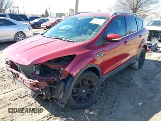 2016 Ford Escape Titanium with VIN 1FMCU9J98GUB42453, listed as a IAAI auction lot 41760110 with 116,452 mi miles. Bid and sale history available at carsss.com. Image 20.