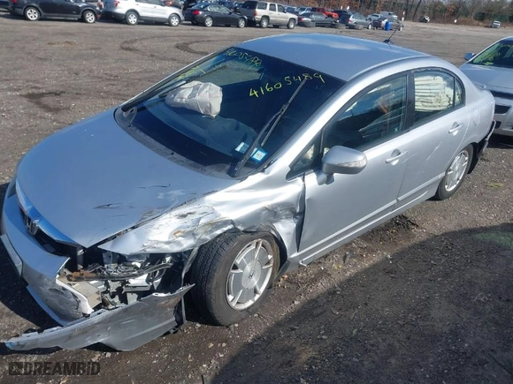 2009 Honda Civic Hybrid with VIN JHMFA36219S011249, listed as a IAAI auction lot 41605489 with 164,920 mi miles. Bid and sale history available at carsss.com. Image 6.