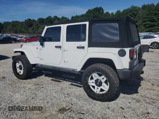 2015 Jeep Wrangler Unlimited Sahara with VIN 1C4BJWEG3FL584920, listed as a Copart auction lot 61843525 with 62,876 mi miles and Salvage title. Bid and sale history available at DreamBid. Image 2.