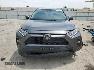 2021 Toyota RAV4 XLE with VIN 2T3W1RFVXMC102648, listed as a Copart auction lot 59706965 with 85,545 mi miles and Salvage title. Bid and sale history available at DreamBid. Image 5.