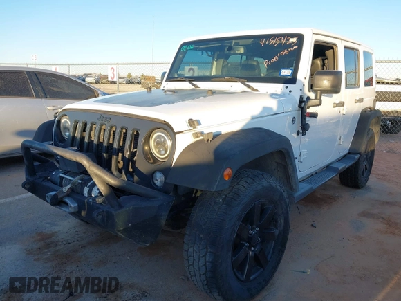 2014 Jeep Wrangler Unlimited Sahara with VIN 1C4BJWEG0EL273475, listed as a IAAI auction lot 41515425 with 128,900 mi miles. Bid and sale history available at carsss.com. Image 6.
