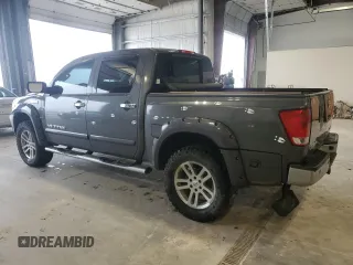 2012 Nissan Titan SL with VIN 1N6BA0ECXCN300562, listed as a Copart auction lot 58244125 with 131,595 mi miles and Salvage title. Bid and sale history available at DreamBid. Image 2.