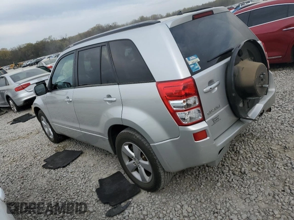 2010 Suzuki Grand Vitara Limited z VIN JS3TE0D73A4100112, wystawiony jako Copart lot #50907365 z przebiegiem 146 484 mil mil oraz Szkoda całkowita • Salvage title. Historia ofert i sprzedaży dostępna na DreamBid. Obrazek 2.